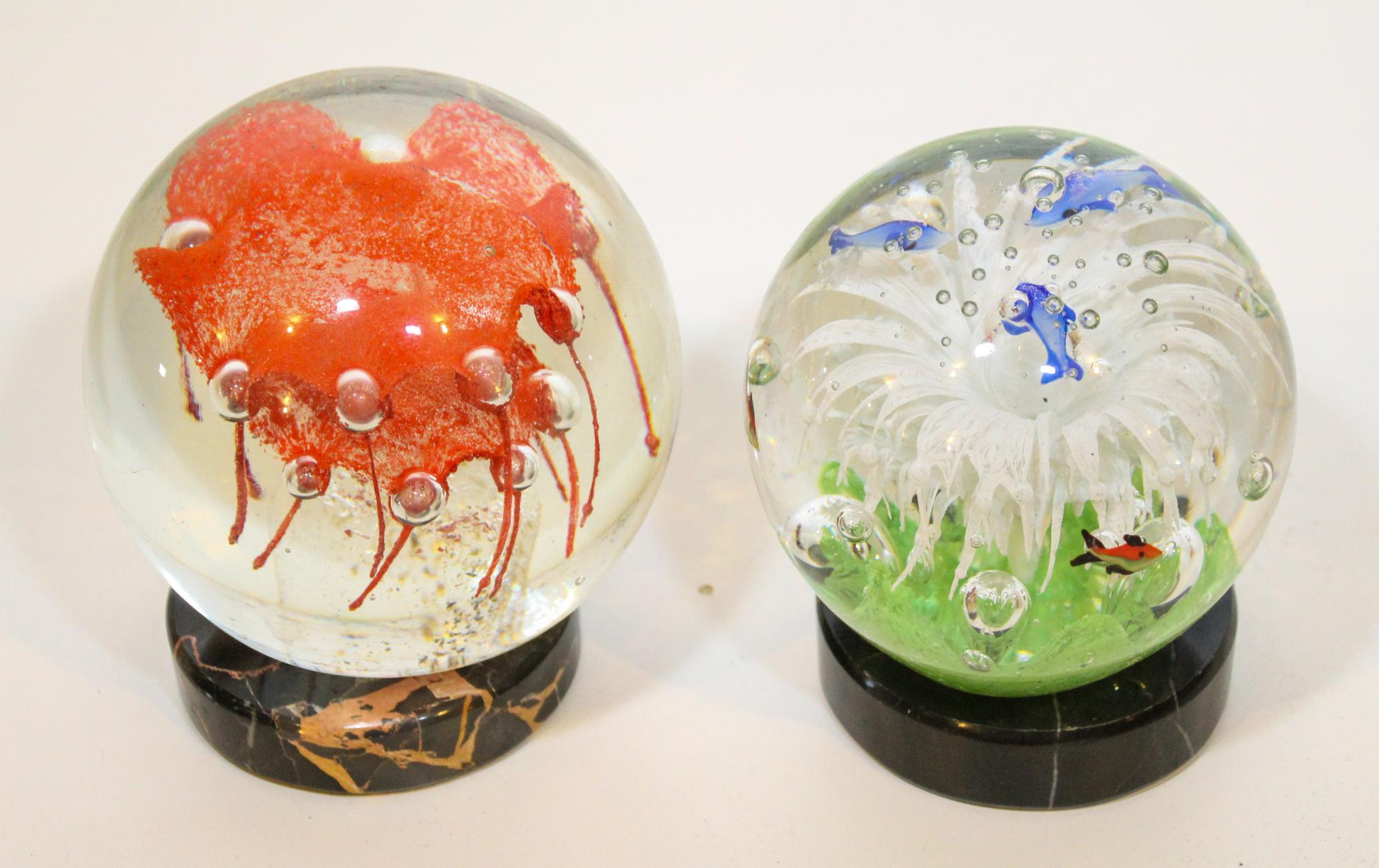 Two Glass Paperweights. Height of taller 4 1/2 inches.