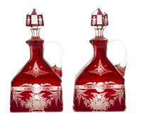 A Pair of Bohemian Cranberry Flashed Glass Decanters Height 10 1/4 inches. — 19TH CENTURY