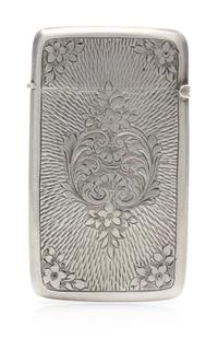 An Edwardian Silver Vesta Case, Maker's Mark Obscured, Birmingham, 1908, the case worked with S-scroll and floral elements and centered