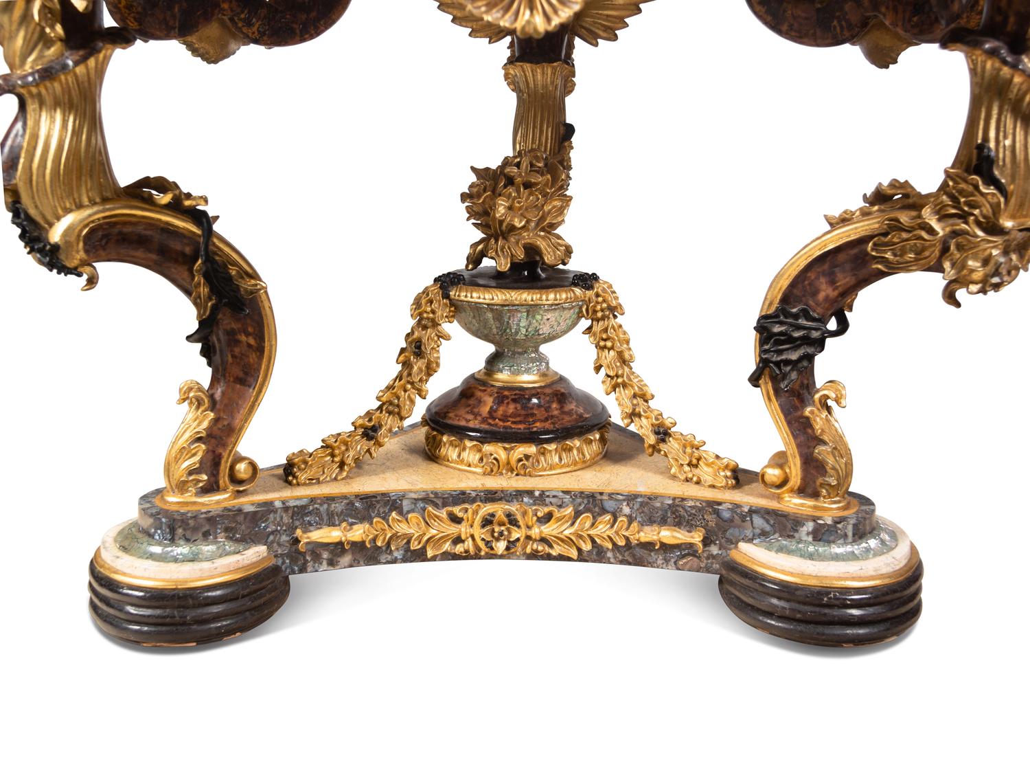 A Continental Parcel Gilt and Ebonized, Pietra Dura and Abalone Inlaid Center Table