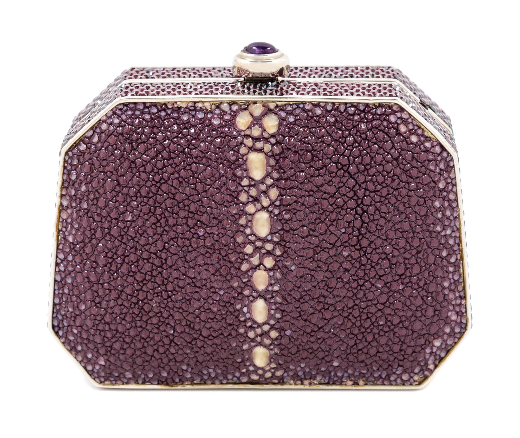 A Judith Leiber Purple Shagreen and Crystal Clutch, 4" x 3" x 1.5".