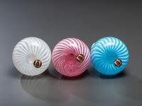 Three Opalescent Swirl Glass Barber Bottles