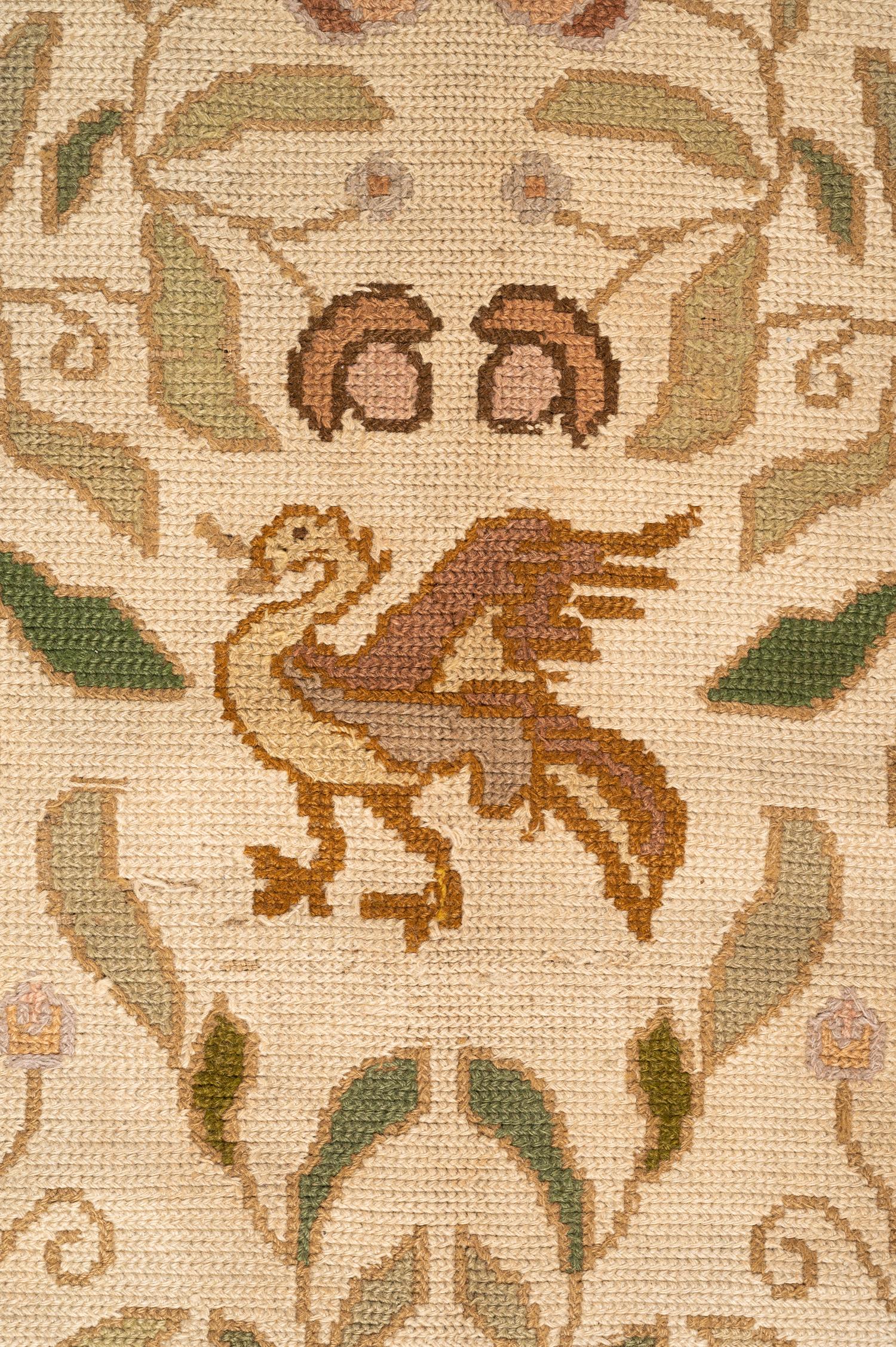 A Portuguese Needlepoint Rug