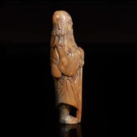 A Chinese carved brown and grey soapstone "Sennin" netsuke 中國壽山石“仙人”根付 18th/ early 19th century ????????