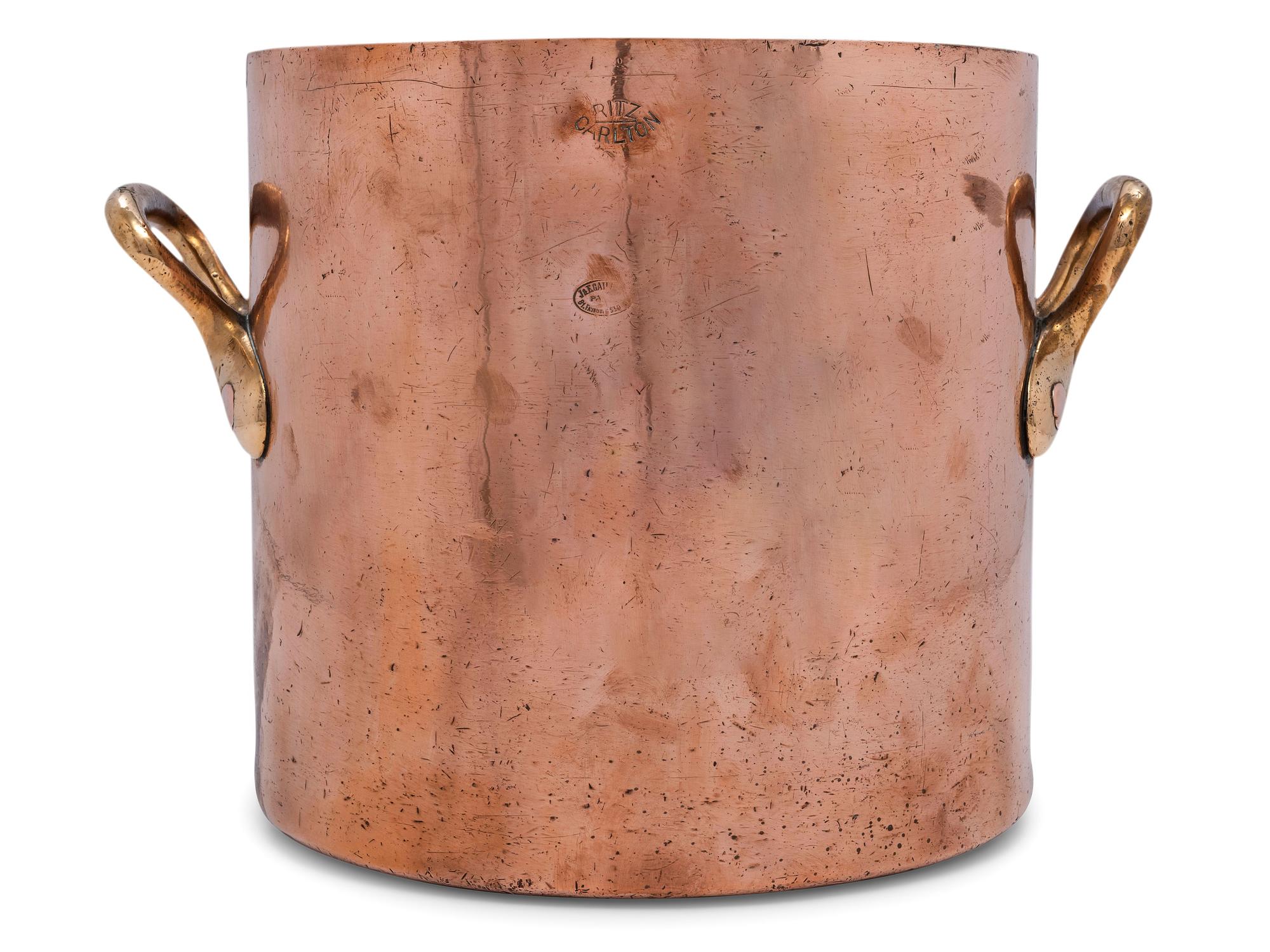 A French Copper Stock Pot with Brass Handles