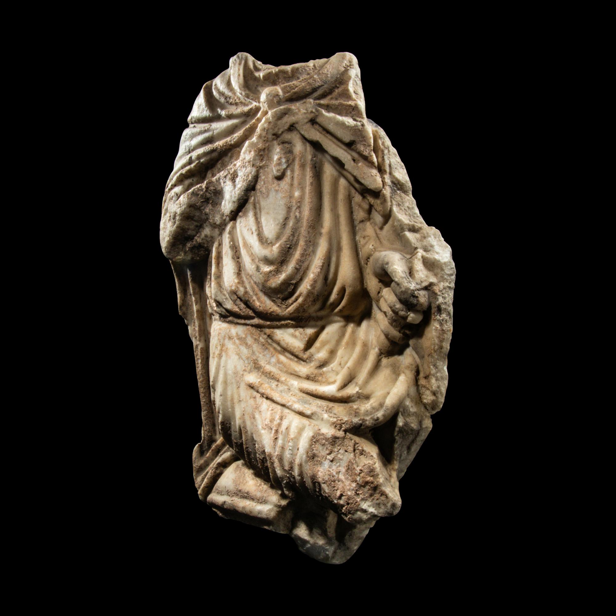 A Roman Marble Fragment of a Seated Offical