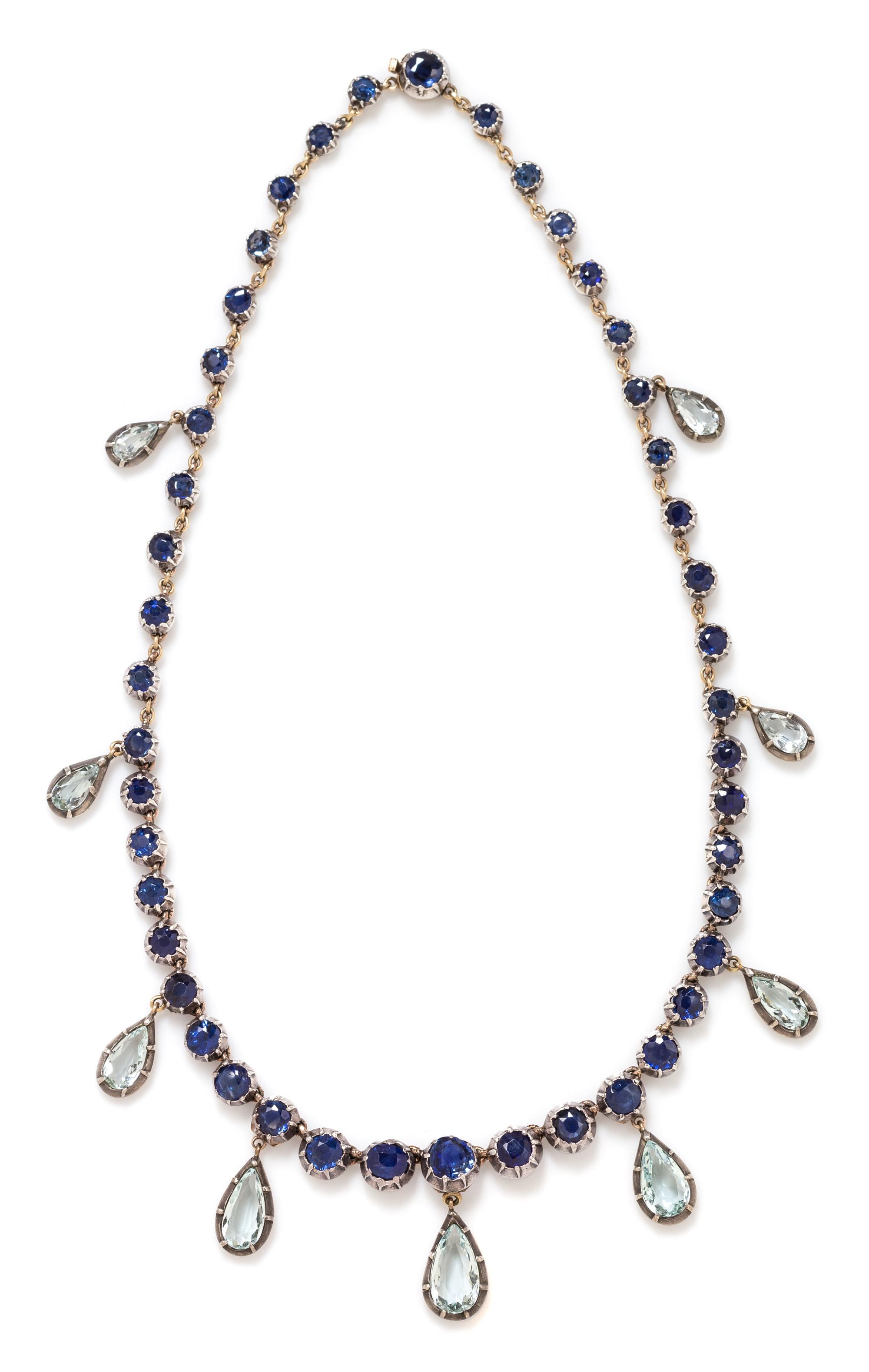 An Antique Silver, Yellow Gold, Sapphire and Aquamarine Fringe Necklace, 30.65 dwts.