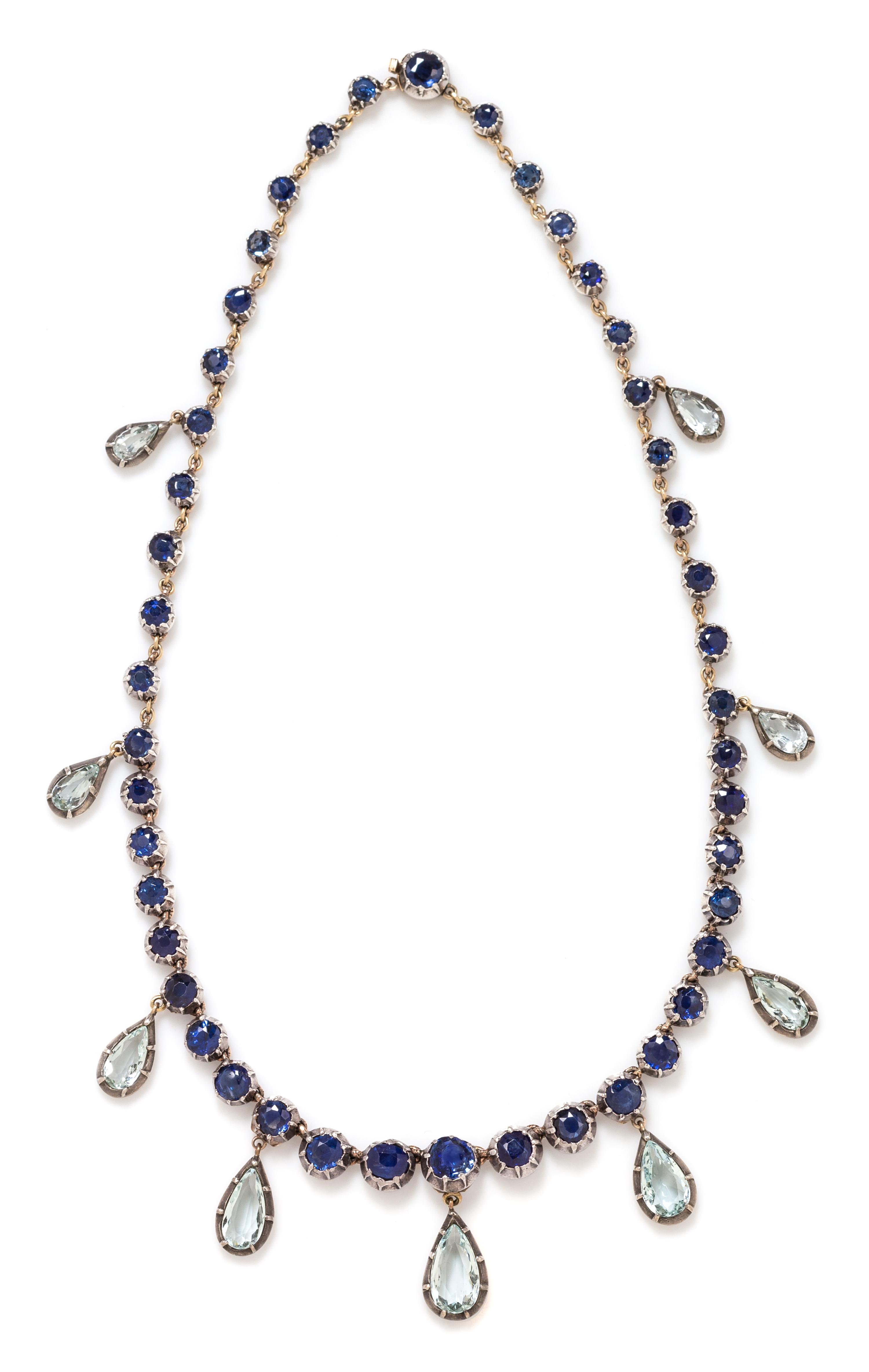 An Antique Silver, Yellow Gold, Sapphire and Aquamarine Fringe Necklace, 30.65 dwts.