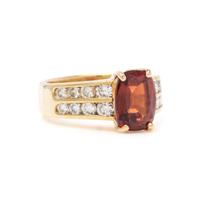 ORANGE GARNET AND DIAMOND RING