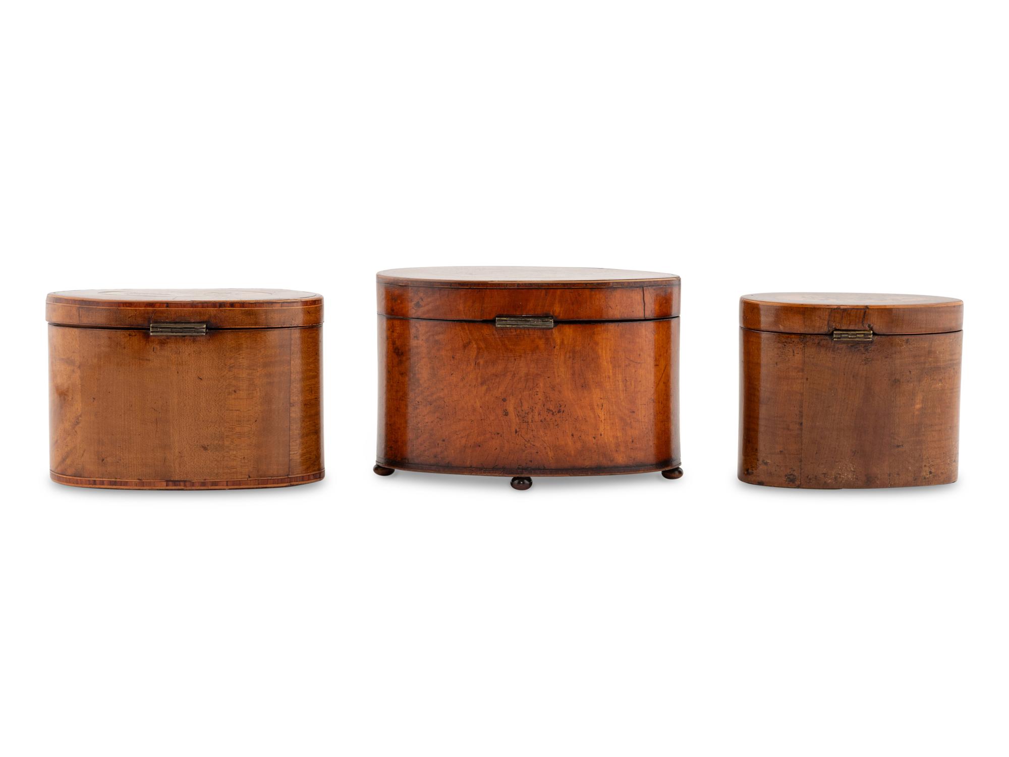 A Group of Three George III Marquetry Tea Caddies
