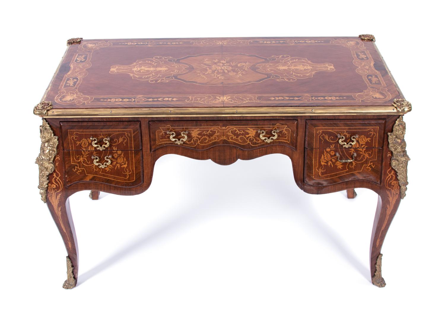 A Louis XV Style Gilt Bronze Mounted Marquetry Writing Table Height 32 1/2 x width 54 x depth 32 inches. — LATE 19TH CENTURY