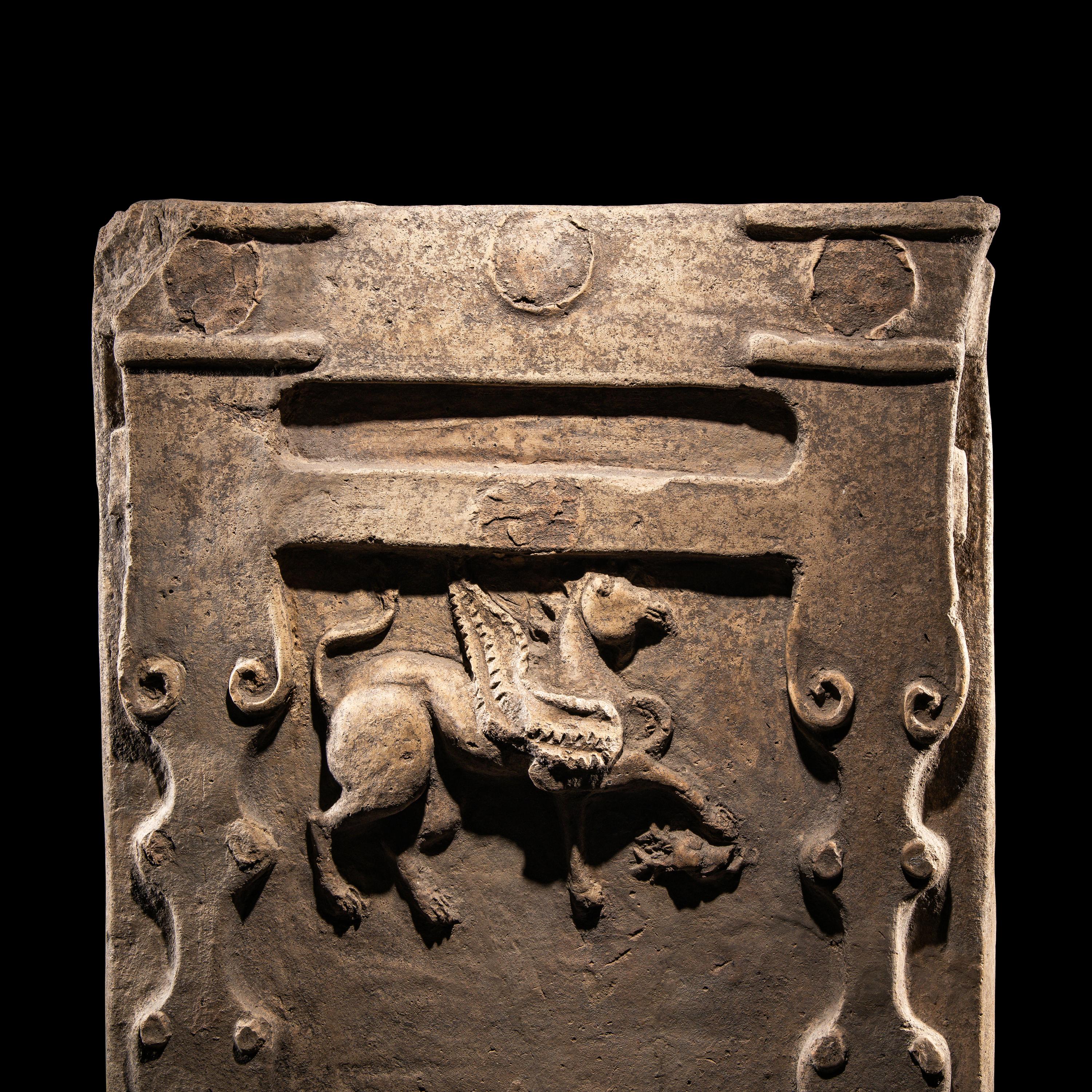 A Tarentine Terracotta Relief with a Griffin