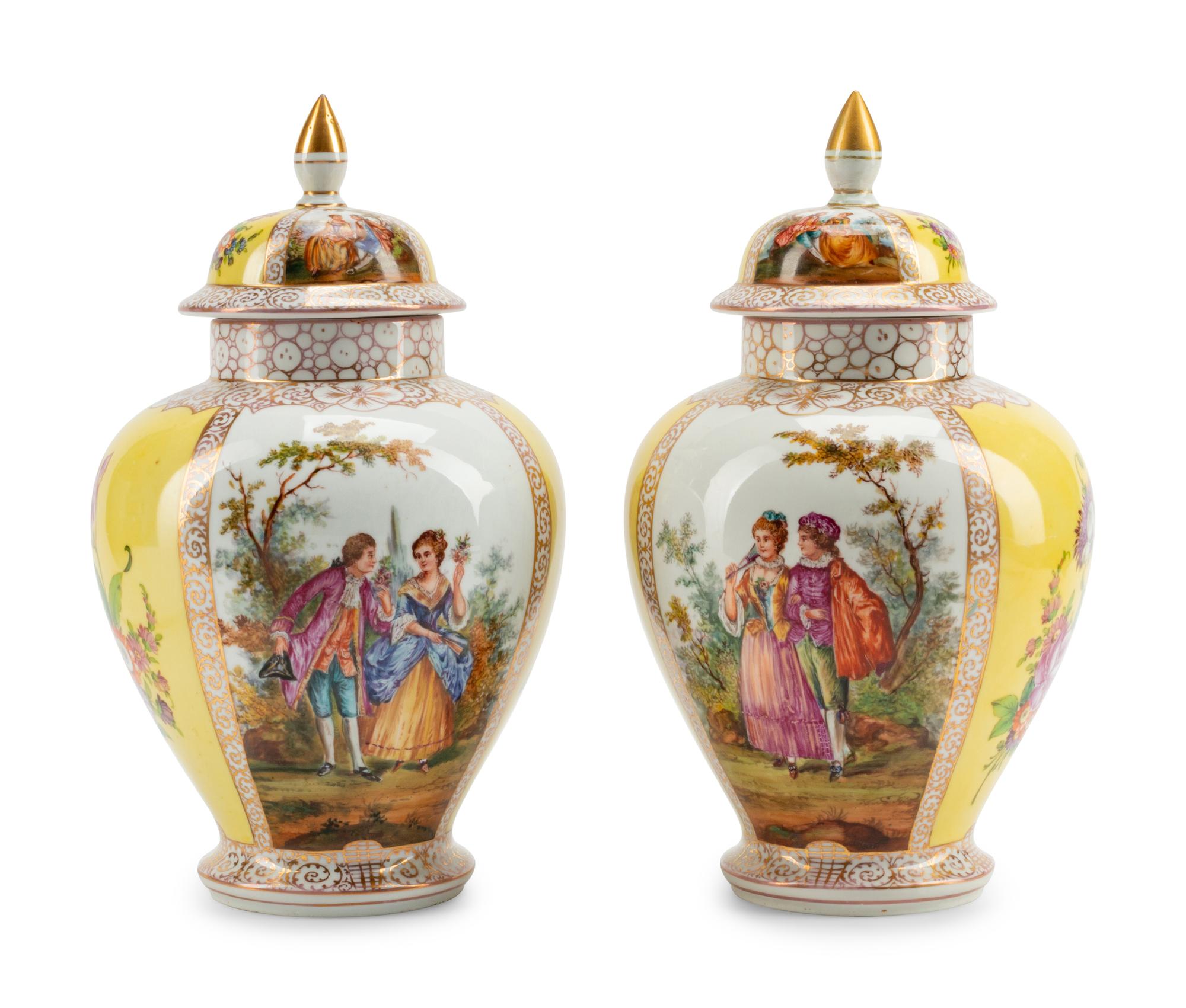 A Pair of Dresden Porcelain Covered Urns