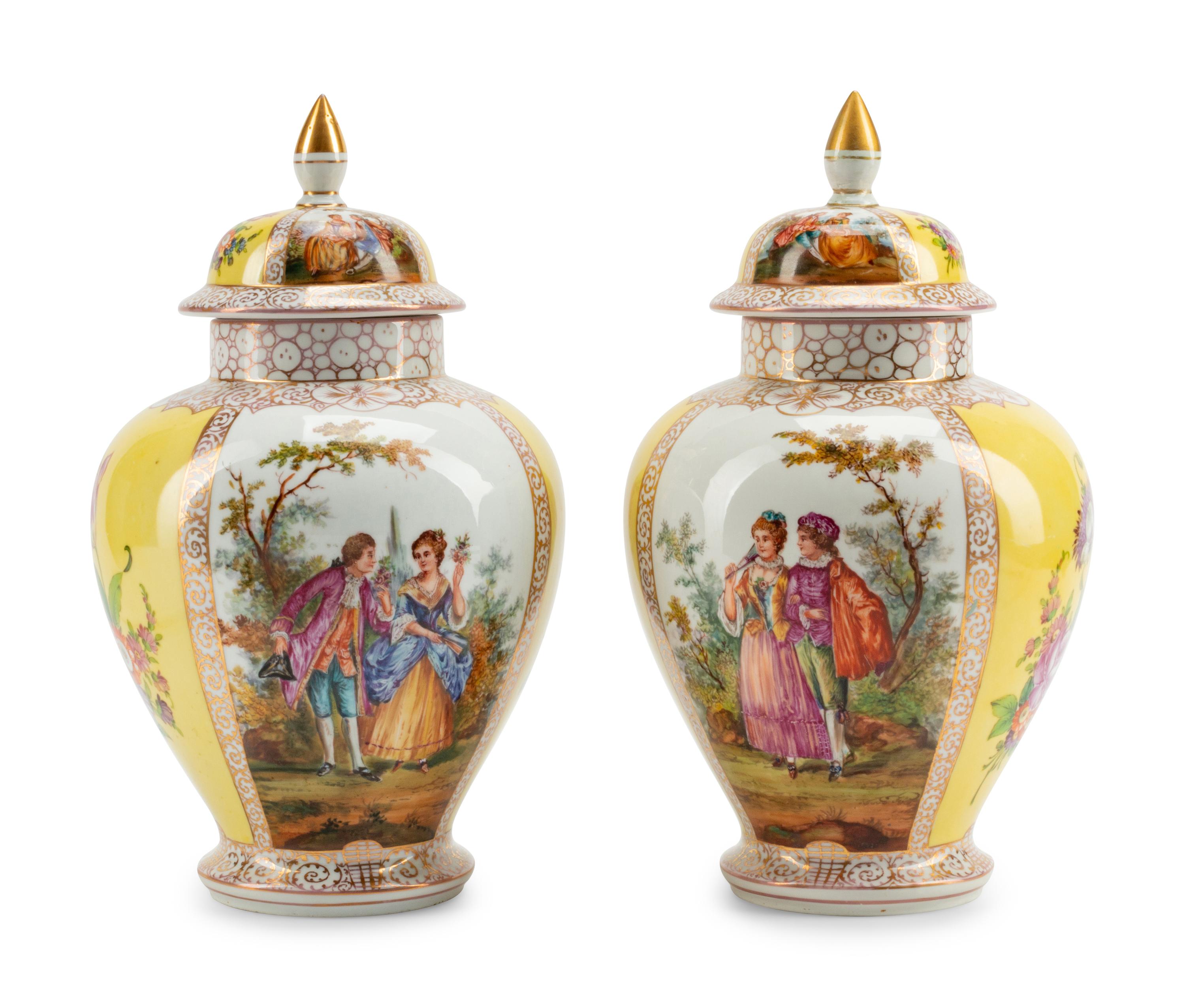 A Pair of Dresden Porcelain Covered Urns