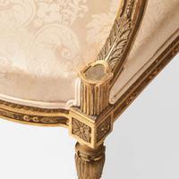 A set of four Louis XVI style giltwood fauteuils 19th century