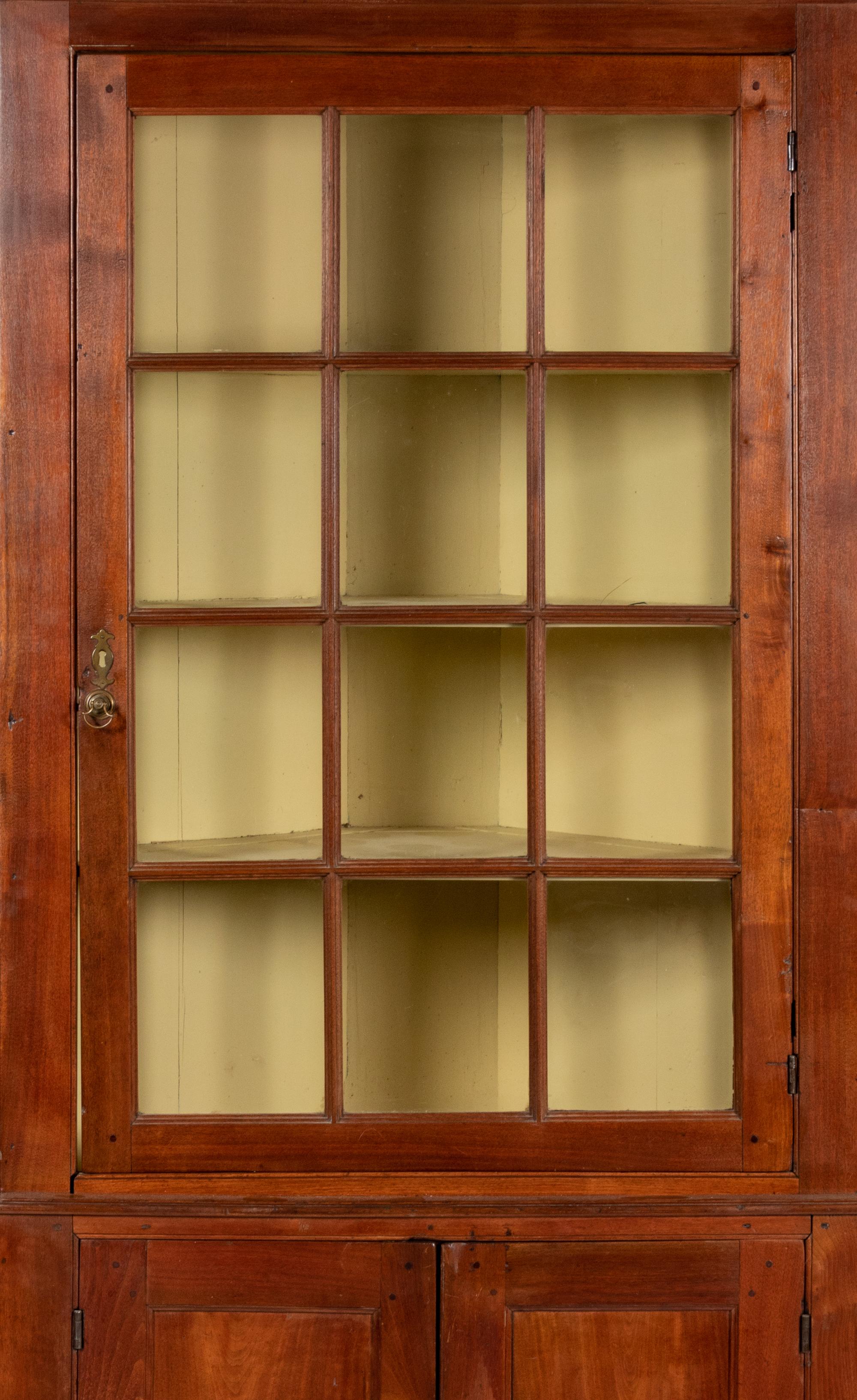 A Chippendale Cherrywood Corner Cupboard