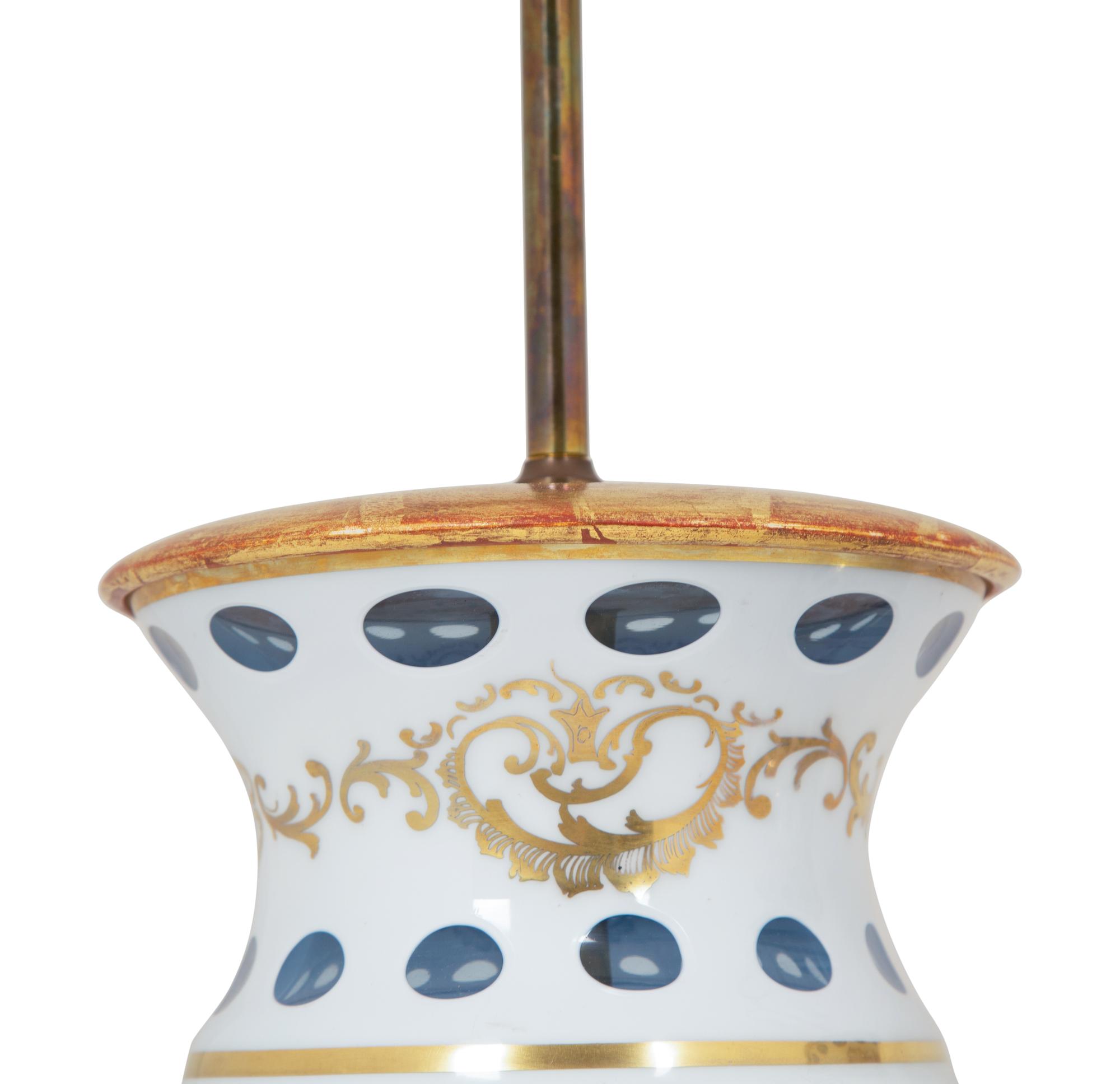 A Pair of Bohemian Enameled White Overlay Glass Baluster Vases