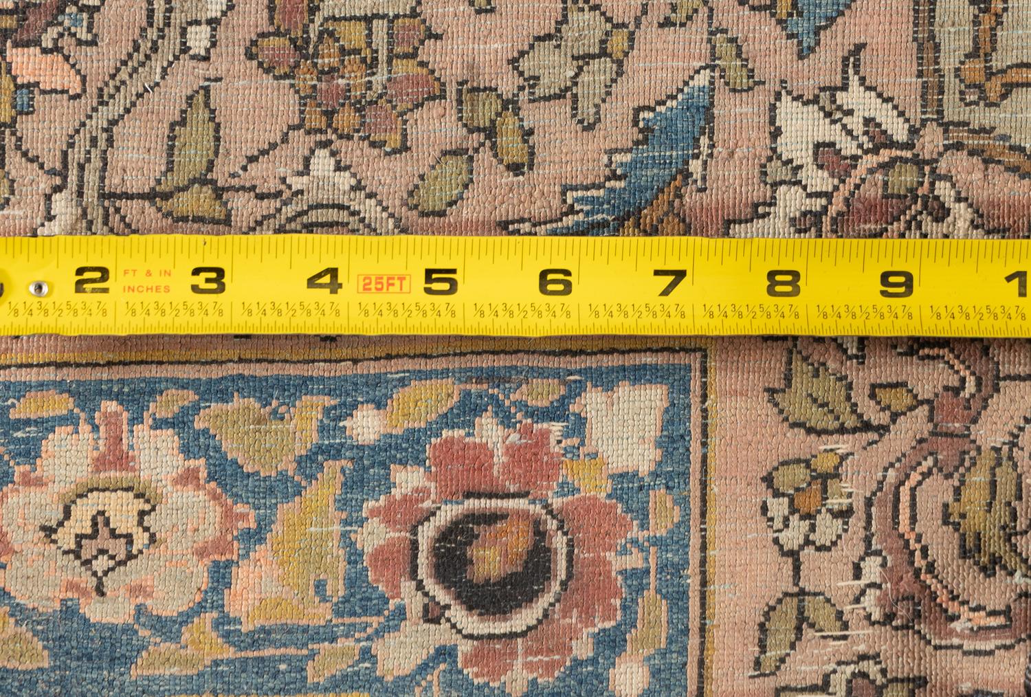 A Kashan Silk Carpet