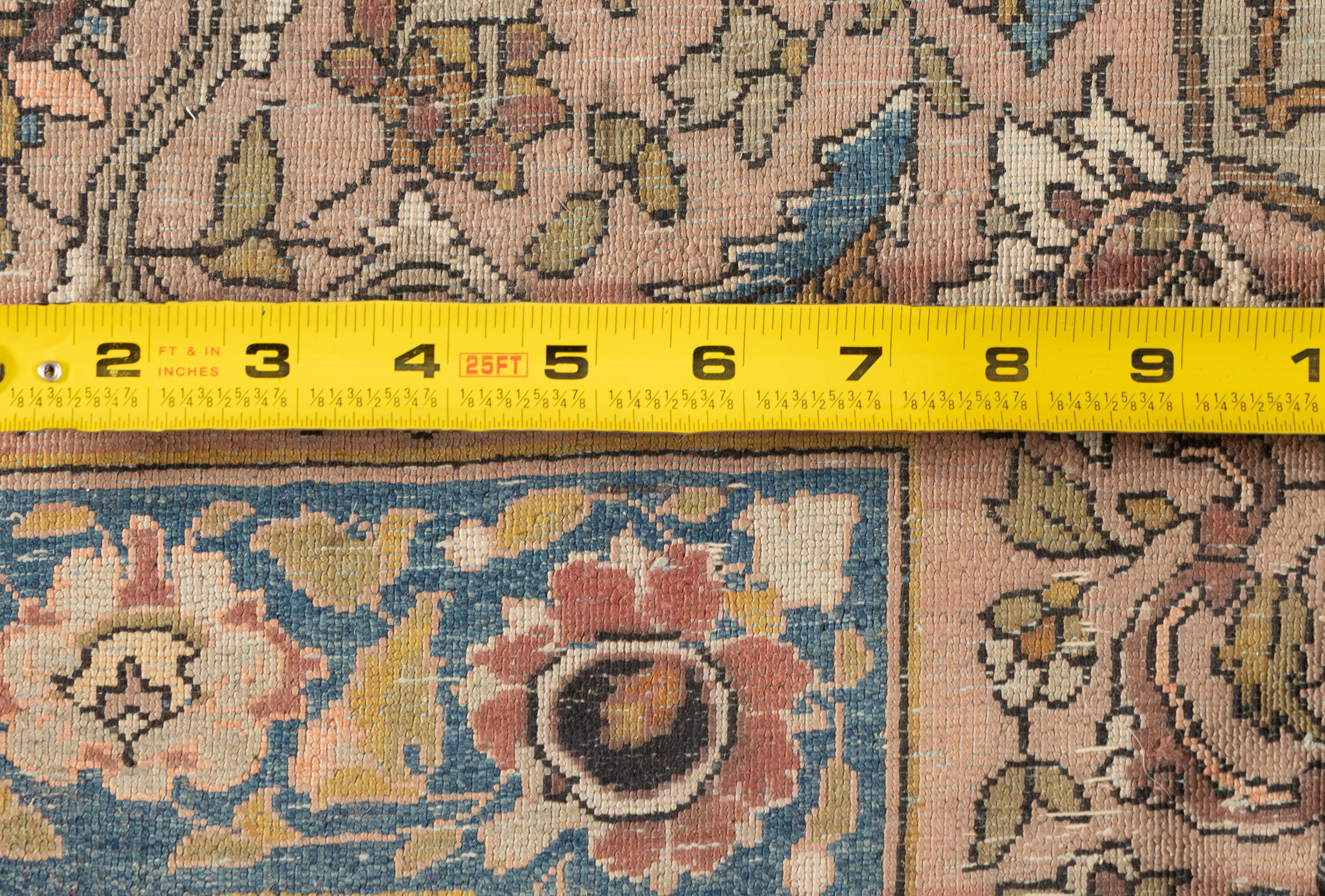 A Kashan Silk Carpet