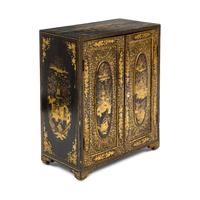 A Chinese Export Black and Gilt Lacquer Collector's Cabinet