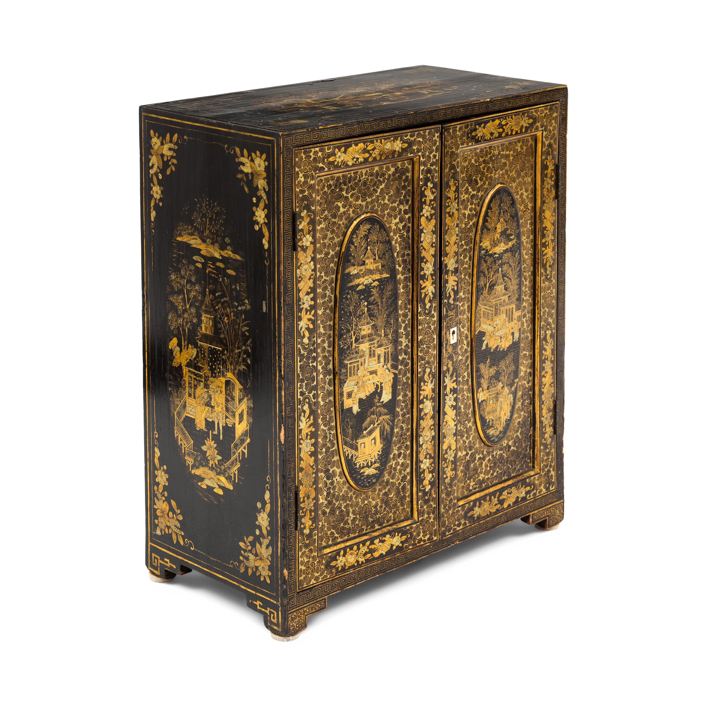 A Chinese Export Black and Gilt Lacquer Collector's Cabinet