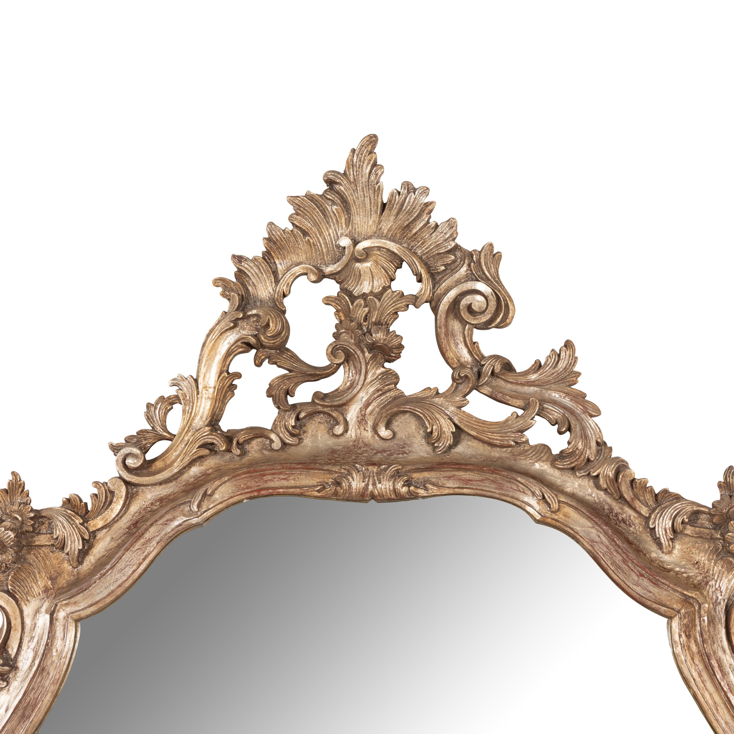 A Pair of Italian Baroque Style Silvered Wood Mirrors