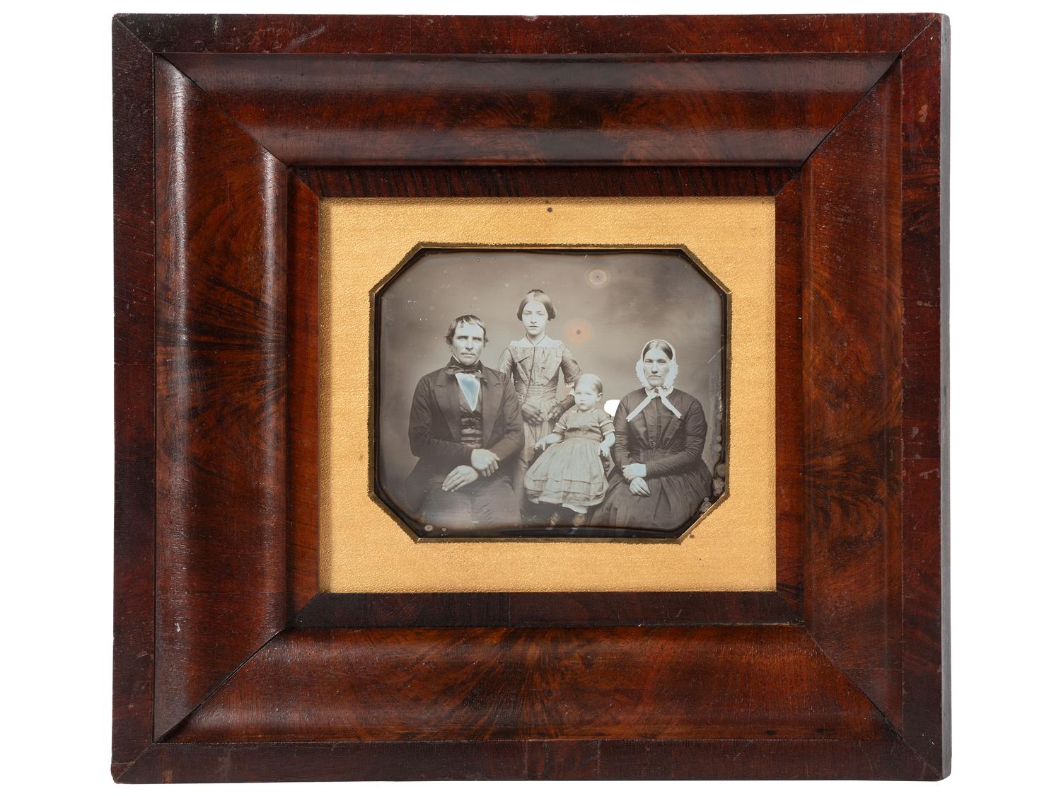 [EARLY PHOTOGRAPHY]. Three-quarter plate daguerreotype of New York farmer and judge Benjamin H. Gorton III, his wife, and daughters.