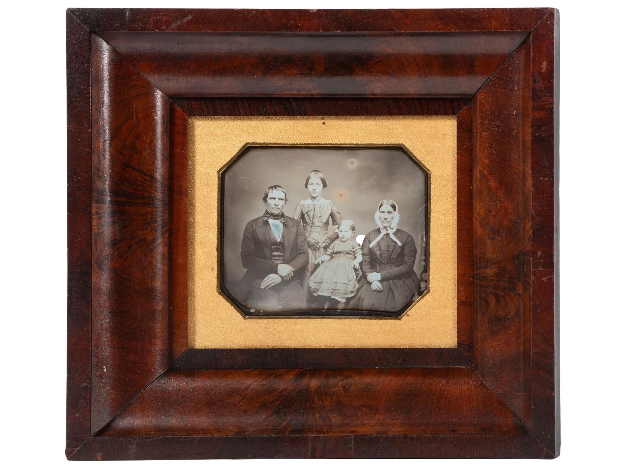 [EARLY PHOTOGRAPHY]. Three-quarter plate daguerreotype of New York farmer and judge Benjamin H. Gorton III, his wife, and daughters.