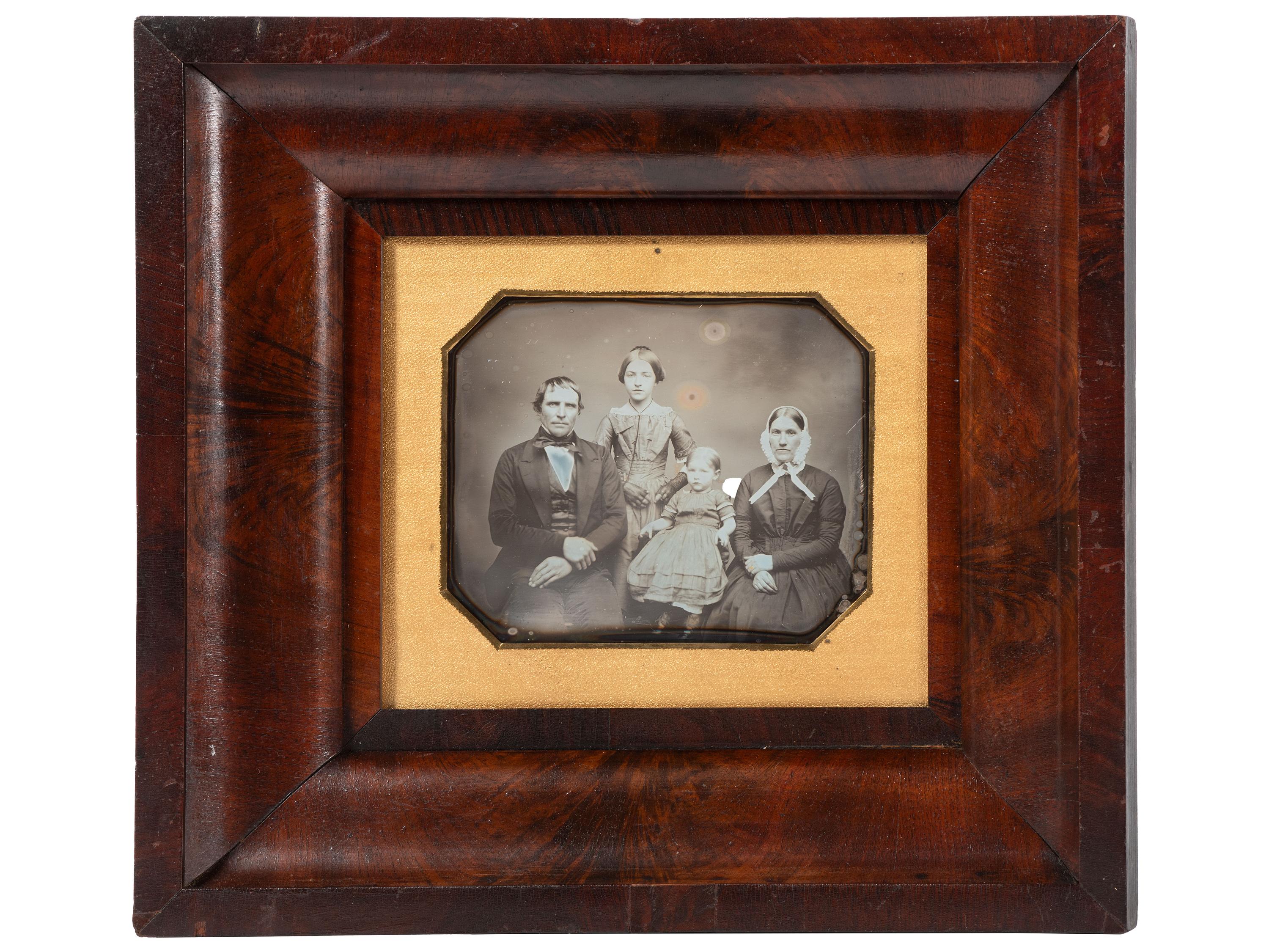 [EARLY PHOTOGRAPHY]. Three-quarter plate daguerreotype of New York farmer and judge Benjamin H. Gorton III, his wife, and daughters.