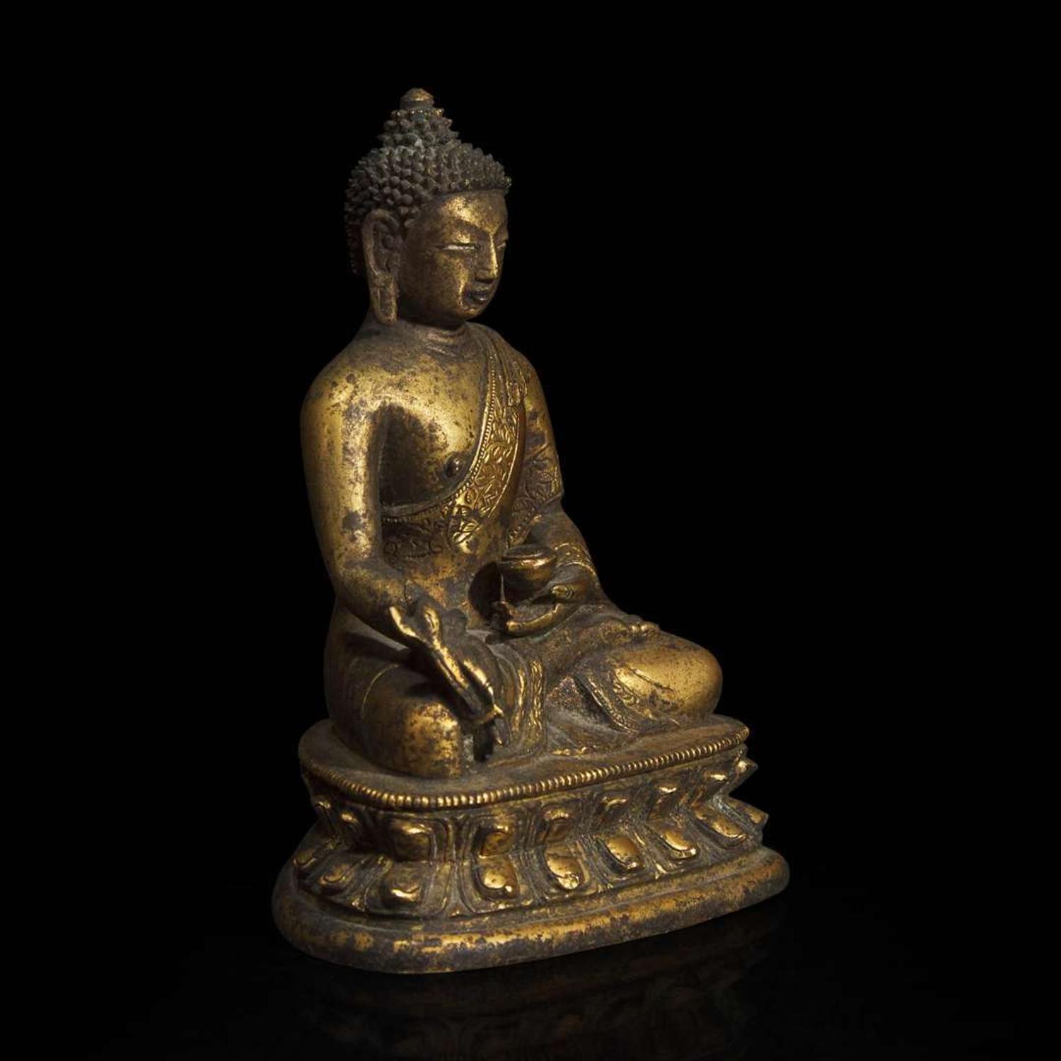A Sino-Tibetan gilt bronze figure of Bhaishajyaguru 鎏金铜药师佛造像 18th century ????