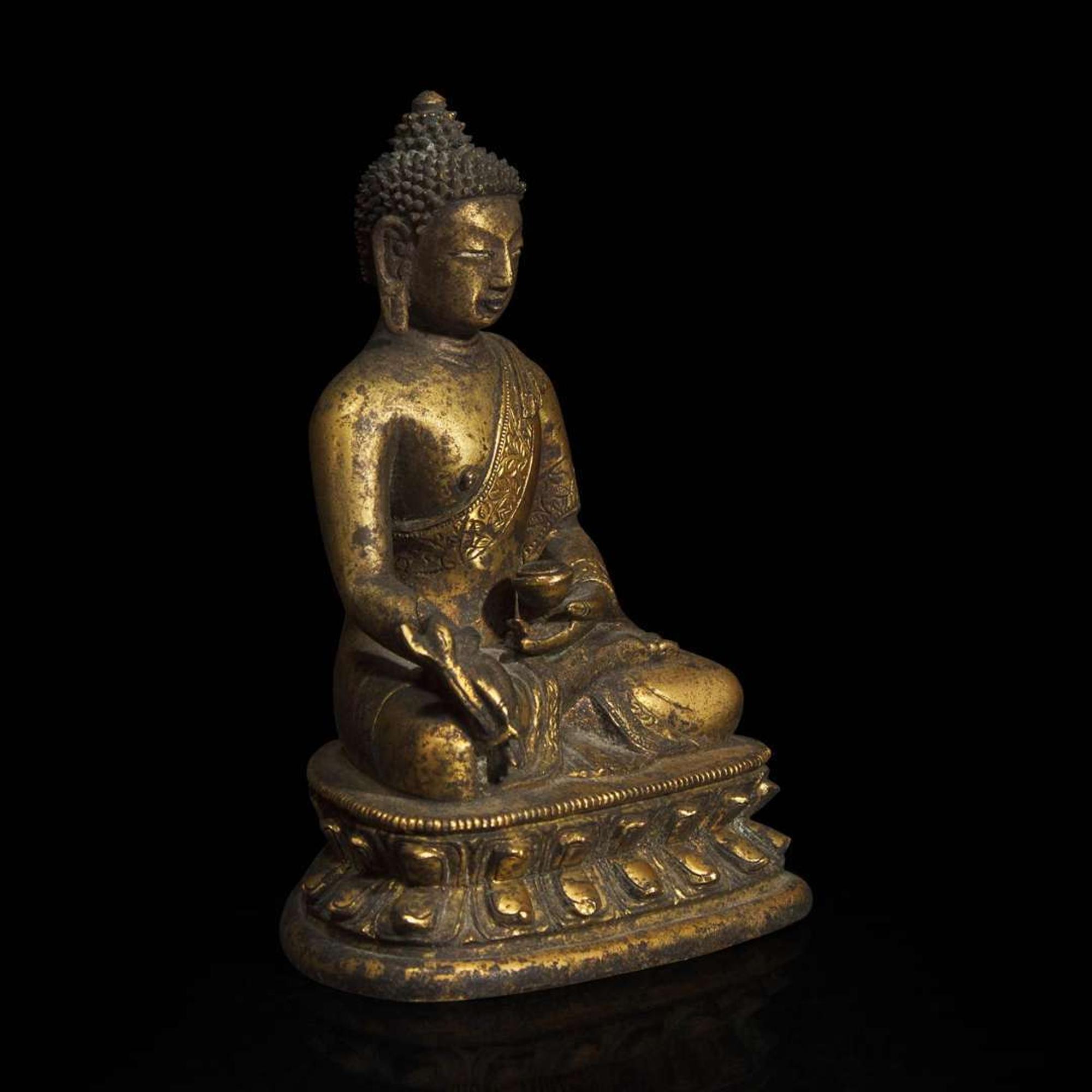 A Sino-Tibetan gilt bronze figure of Bhaishajyaguru 鎏金铜药师佛造像 18th century ????