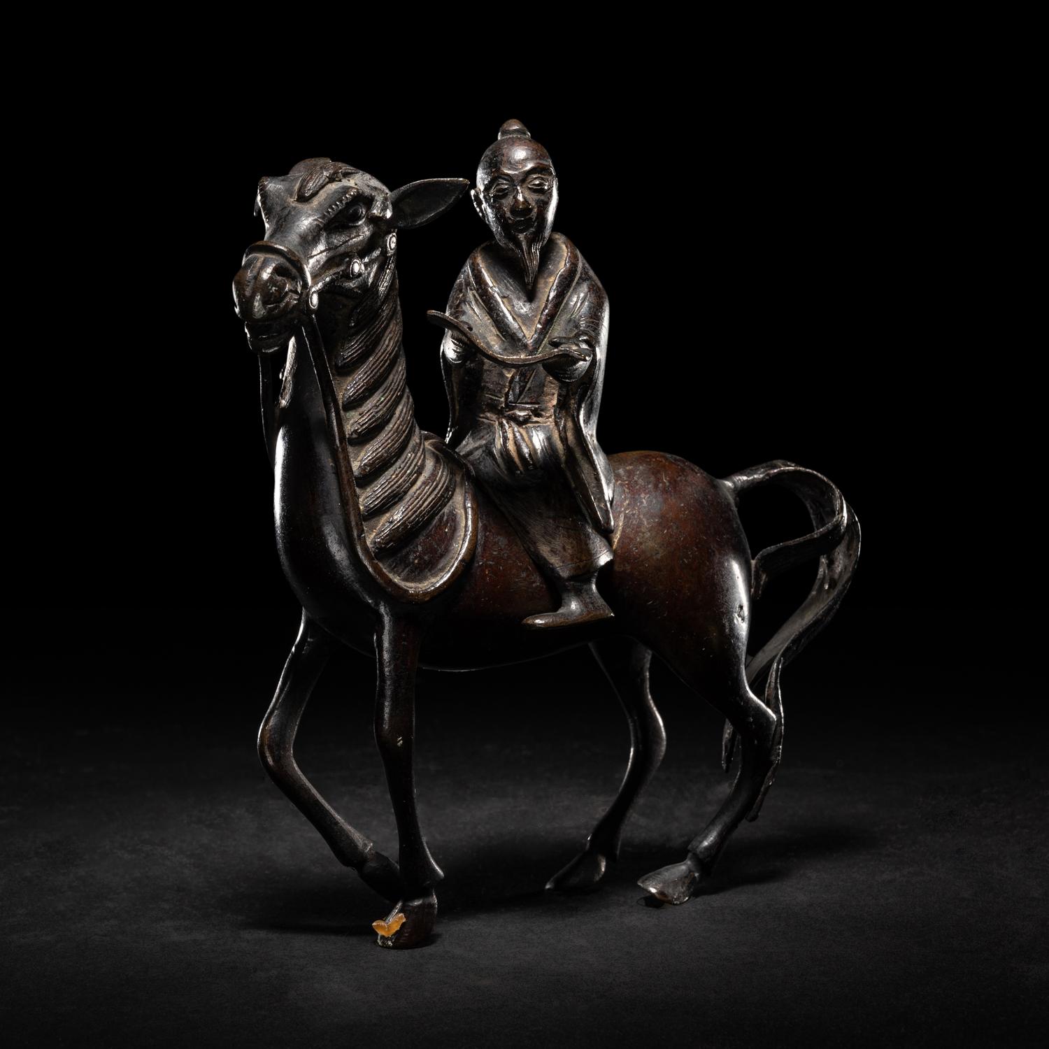 A Chinese Bronze Figural Form Incense Burner