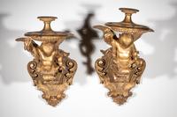 A Pair of Italian Giltwood Figural Wall Brackets