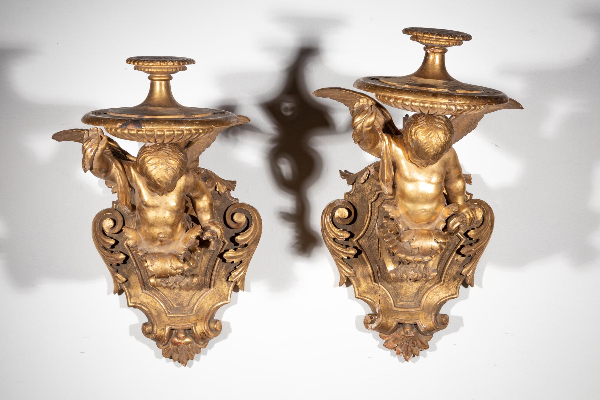 A Pair of Italian Giltwood Figural Wall Brackets