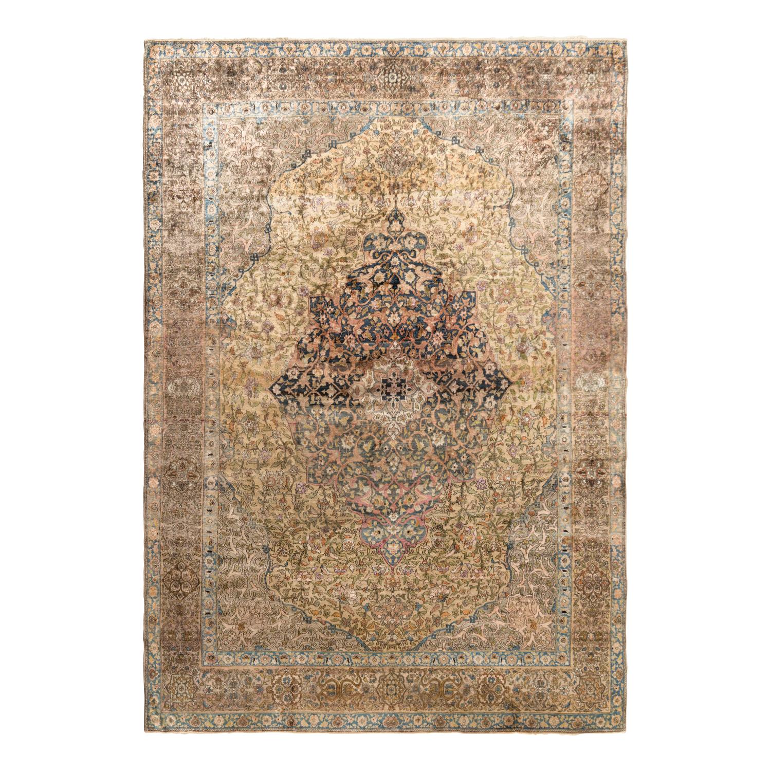A Kashan Silk Carpet