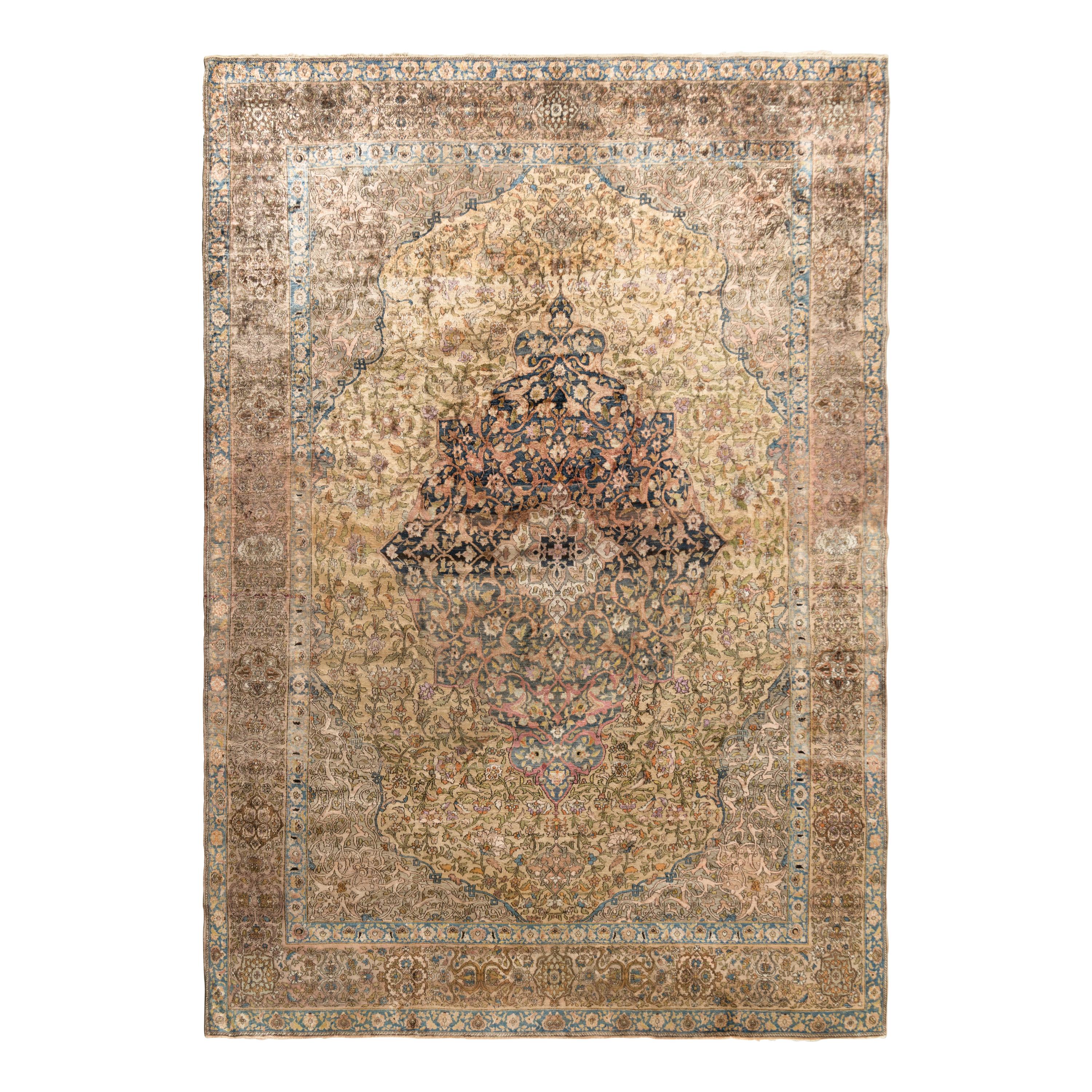 A Kashan Silk Carpet