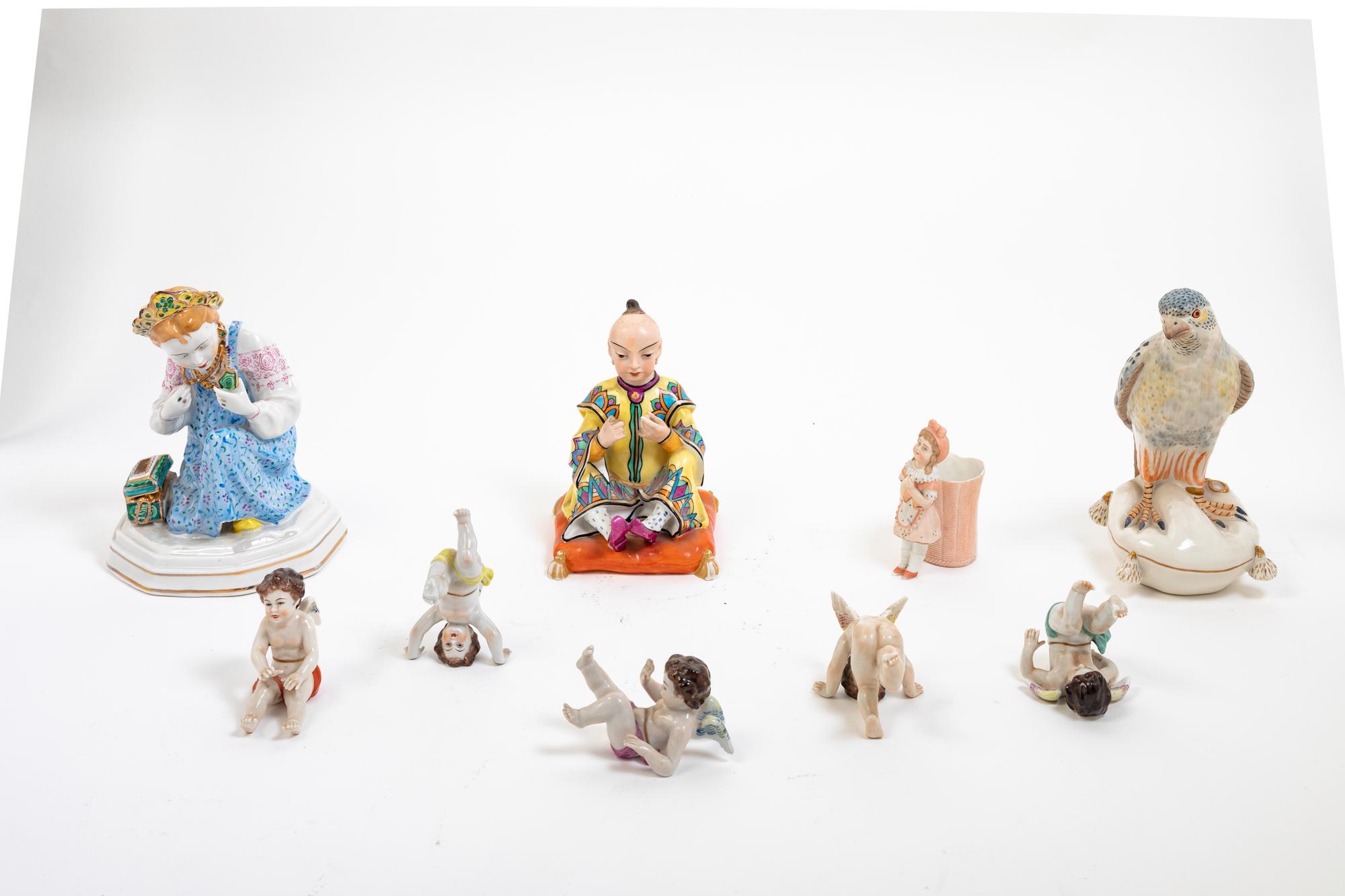Group of Nine Figural Porcelain Articles