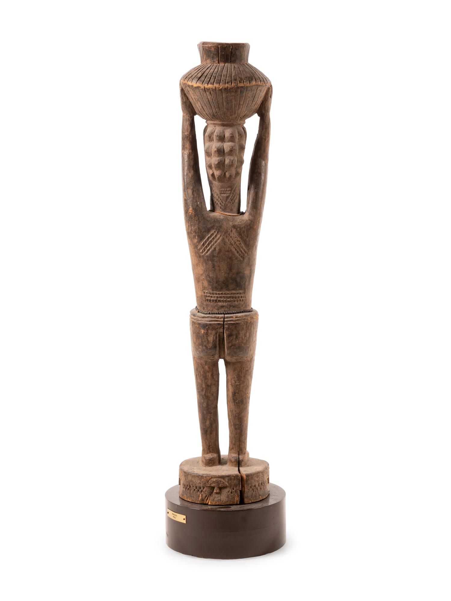 A Senufo Style Carved Wood Figure