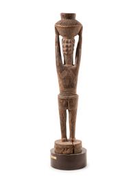 A Senufo Style Carved Wood Figure