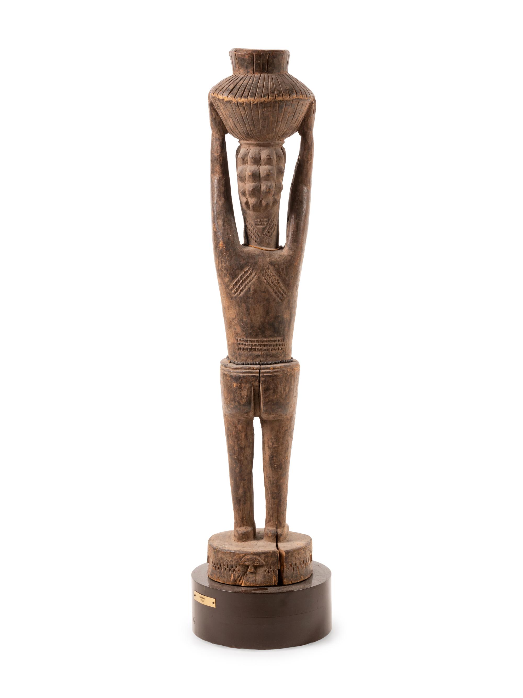 A Senufo Style Carved Wood Figure