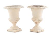 A Pair of Painted Iron Urns