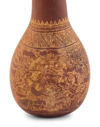 A Carved Gourd Rattle