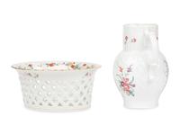A Mottahedeh Porcelain Pitcher and Centerpiece Basket
