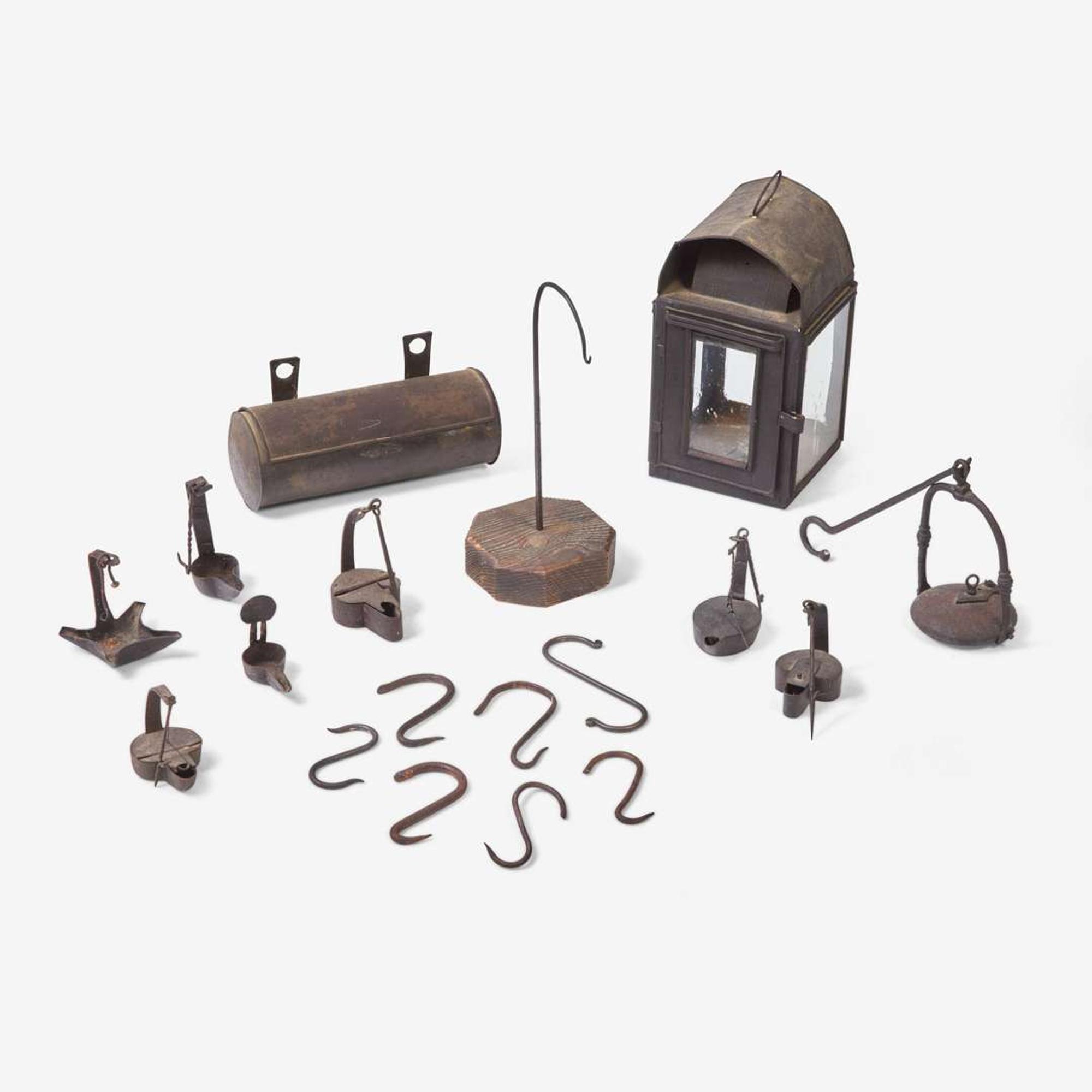A group of ten wrought iron and tinware lighting devices 18th / 19th century