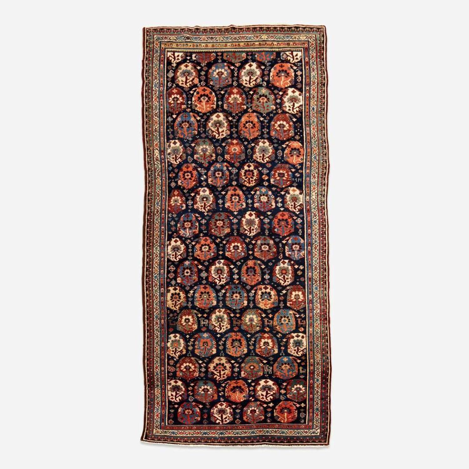 A Senneh Kurd Rug circa early 20th century