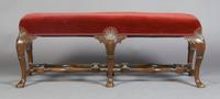 A George II Style Walnut Stool, Height 18 1/4 x width 50 x depth 18 inches.