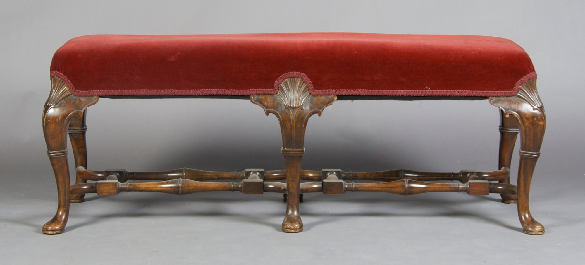 A George II Style Walnut Stool, Height 18 1/4 x width 50 x depth 18 inches.