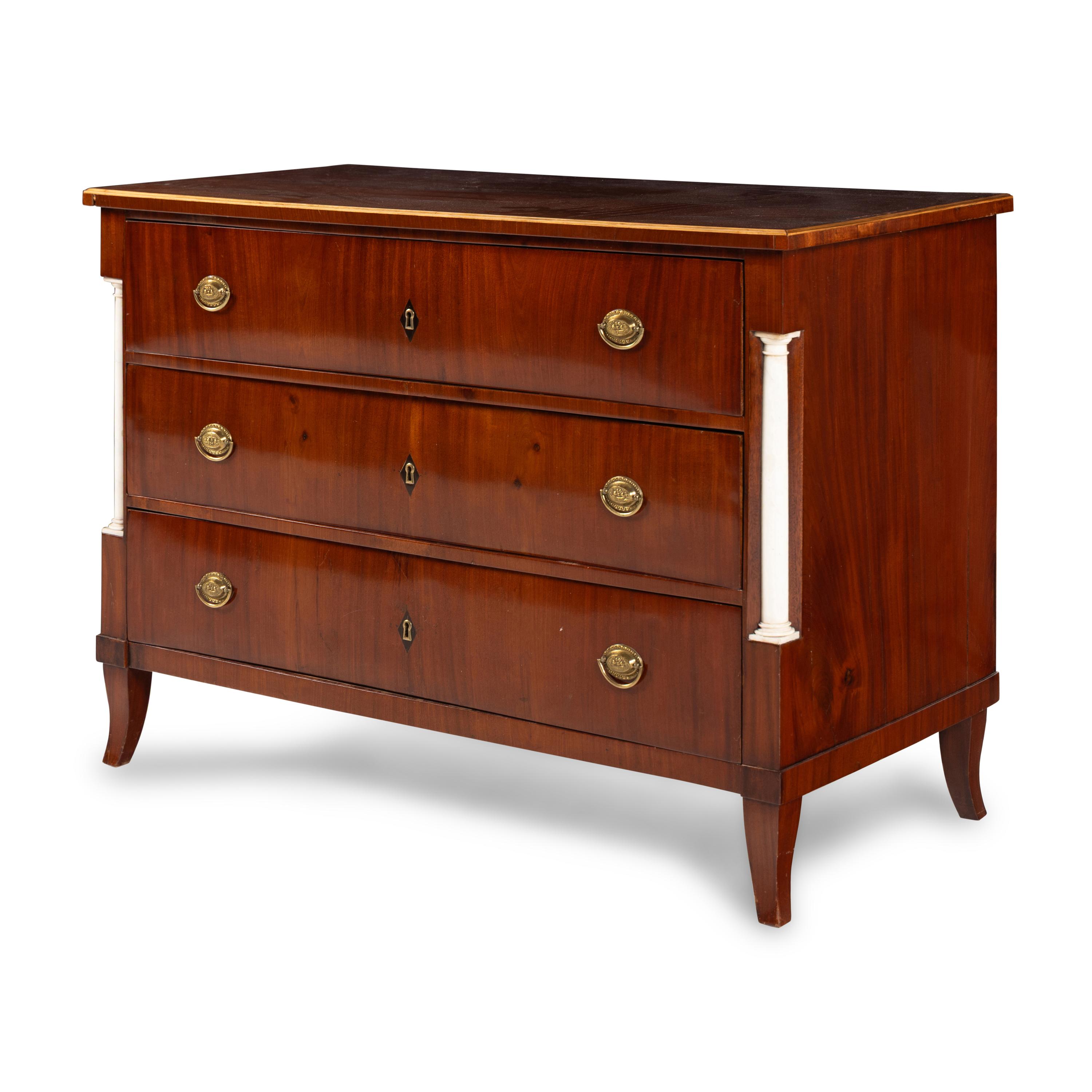 A German Neoclassical Figured Walnut and White Marble Mounted Commode