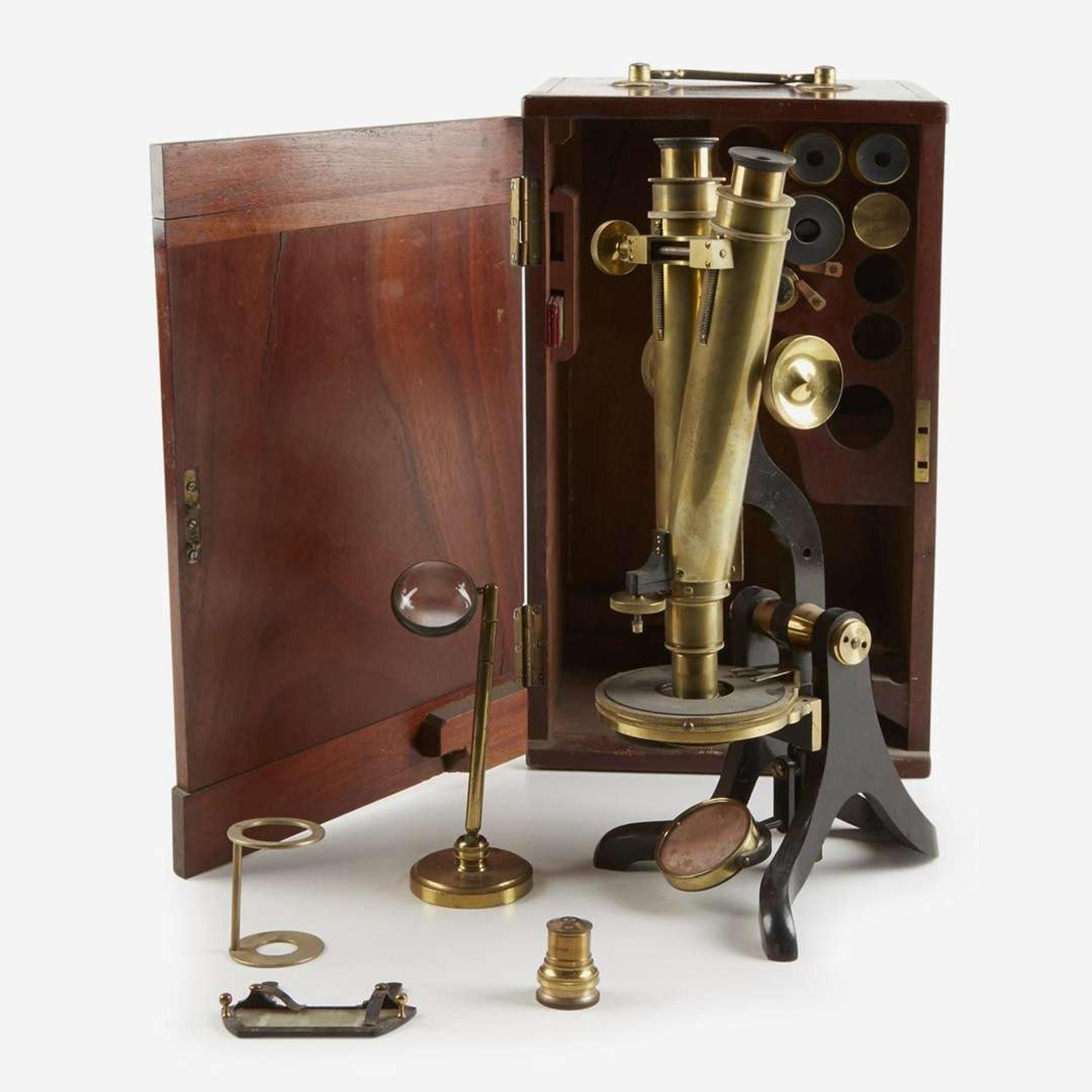 A brass binocular microscope with mahogany traveling chest Henry Crouch, London, retailed by J. W. Queen & Co., Philadelphia, PA, circa 1870s