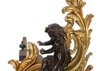 A Pair of Louis XV Style Gilt and Patinated Bronze Chenets